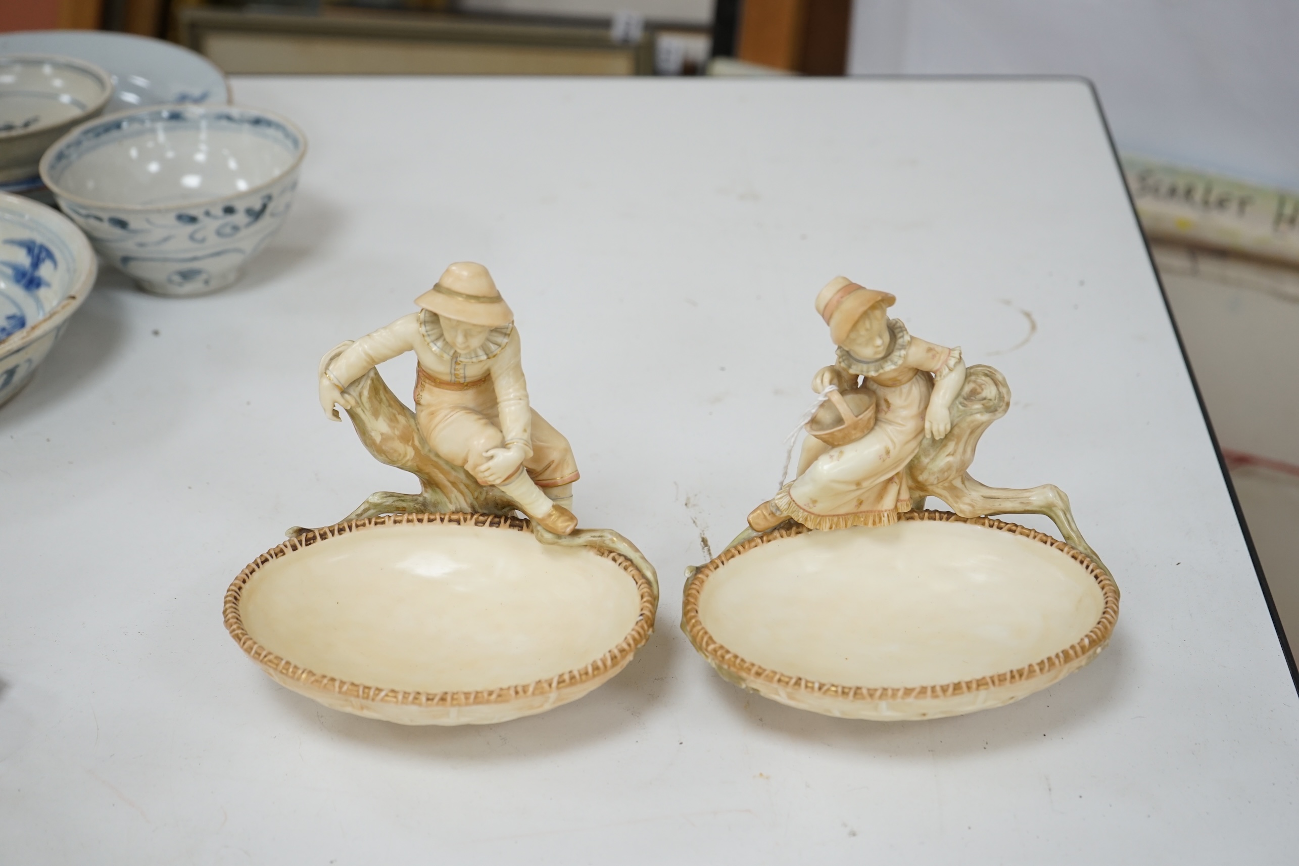 A pair of Royal Worcester sweetmeat dishes modelled by James Hadley, impressed numbers 775 and 776, 16cm. Condition - good